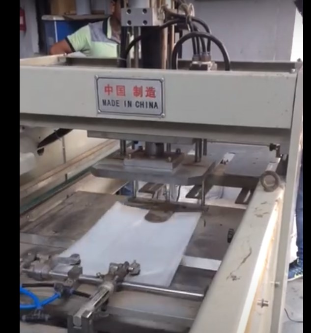 Plastic Bag Punching Machine